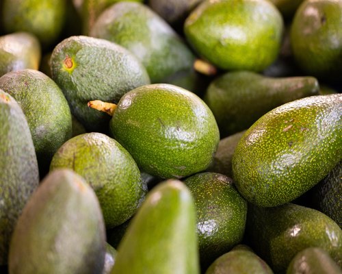 Fresh ingredients from a local Mexican tianguis including vegetables and avocados